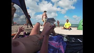 Exhibitionist Wifey 511 - Mrs Smooch gives us her Naked BEACH Point of look view of a Hidden cam Milking OFF in front of her and a few other guys watching!